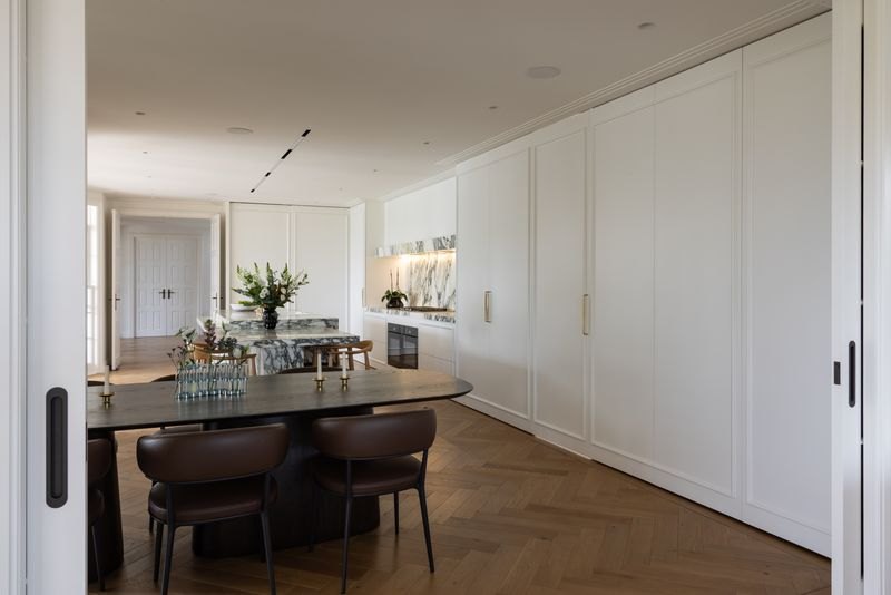 SprayMe factory-lacquered white cabinetry and concealed doors, private residence