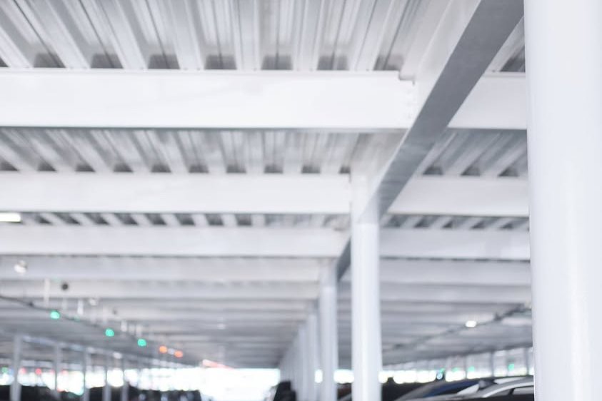 White protective coating system on structural steel, commercial parking structure
